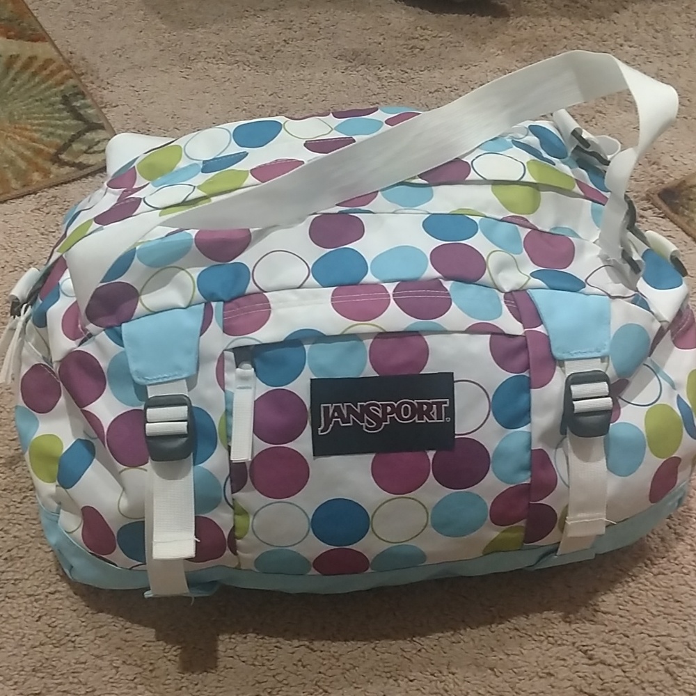 Jansport polka dot duffle bag.